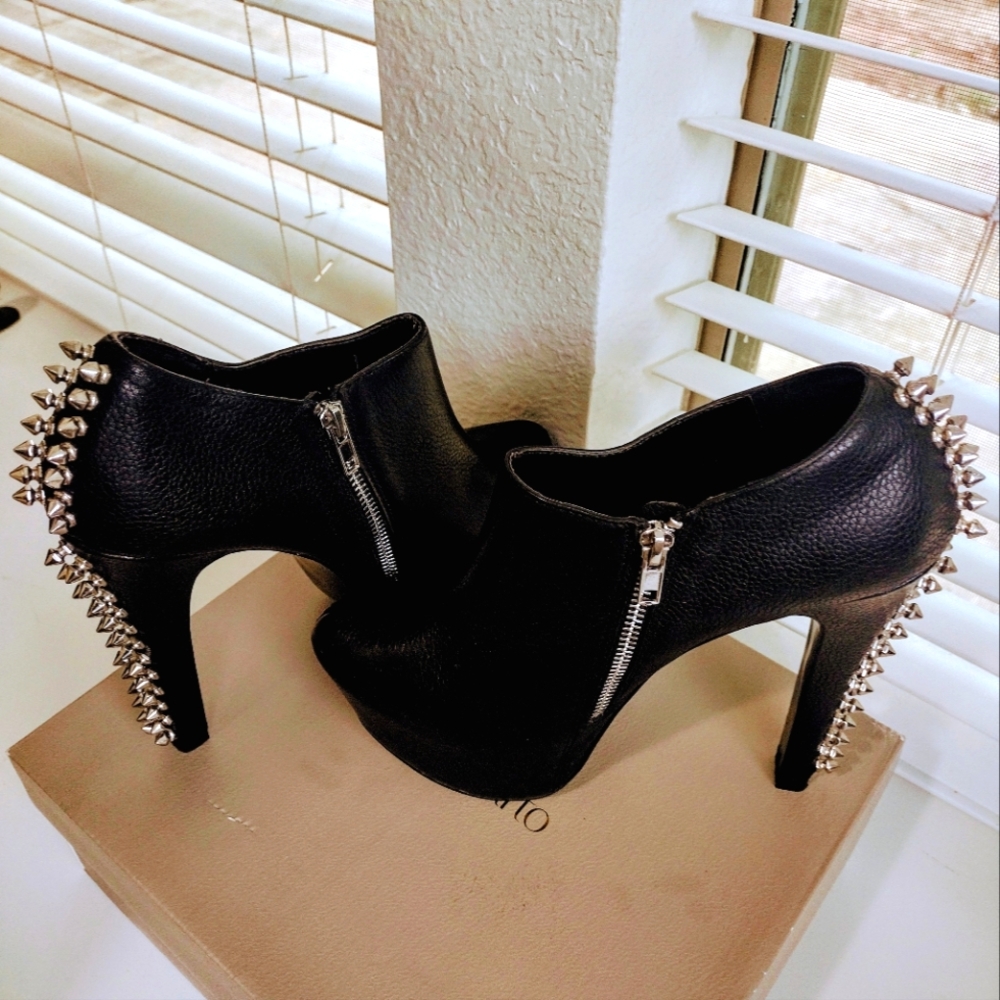 Steven Madden spiked heeled boots. NEW without a tag.